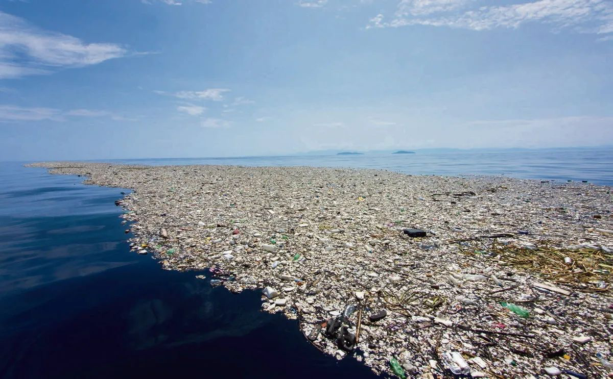 Aerial view of ocean plastic waste — chemical pollution at scale